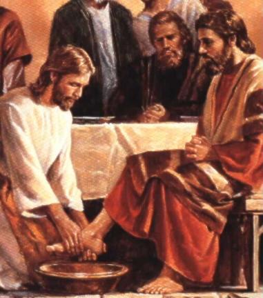 Jesus washes the feet of the apostles.